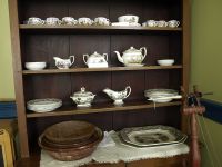 row-of-dishes-in-dining-room-of-Cottage